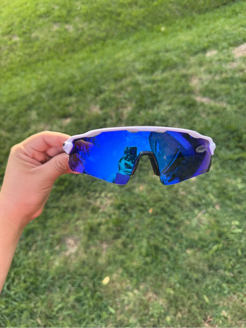 Oakley White Frame Sunglasses with Blue Mirrored Lens